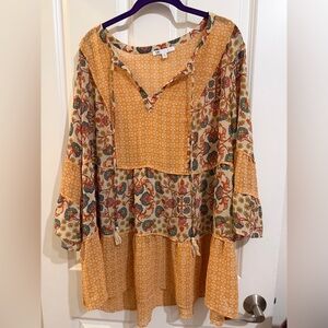 DR2 belle sleeve sheer long line high low blouse.